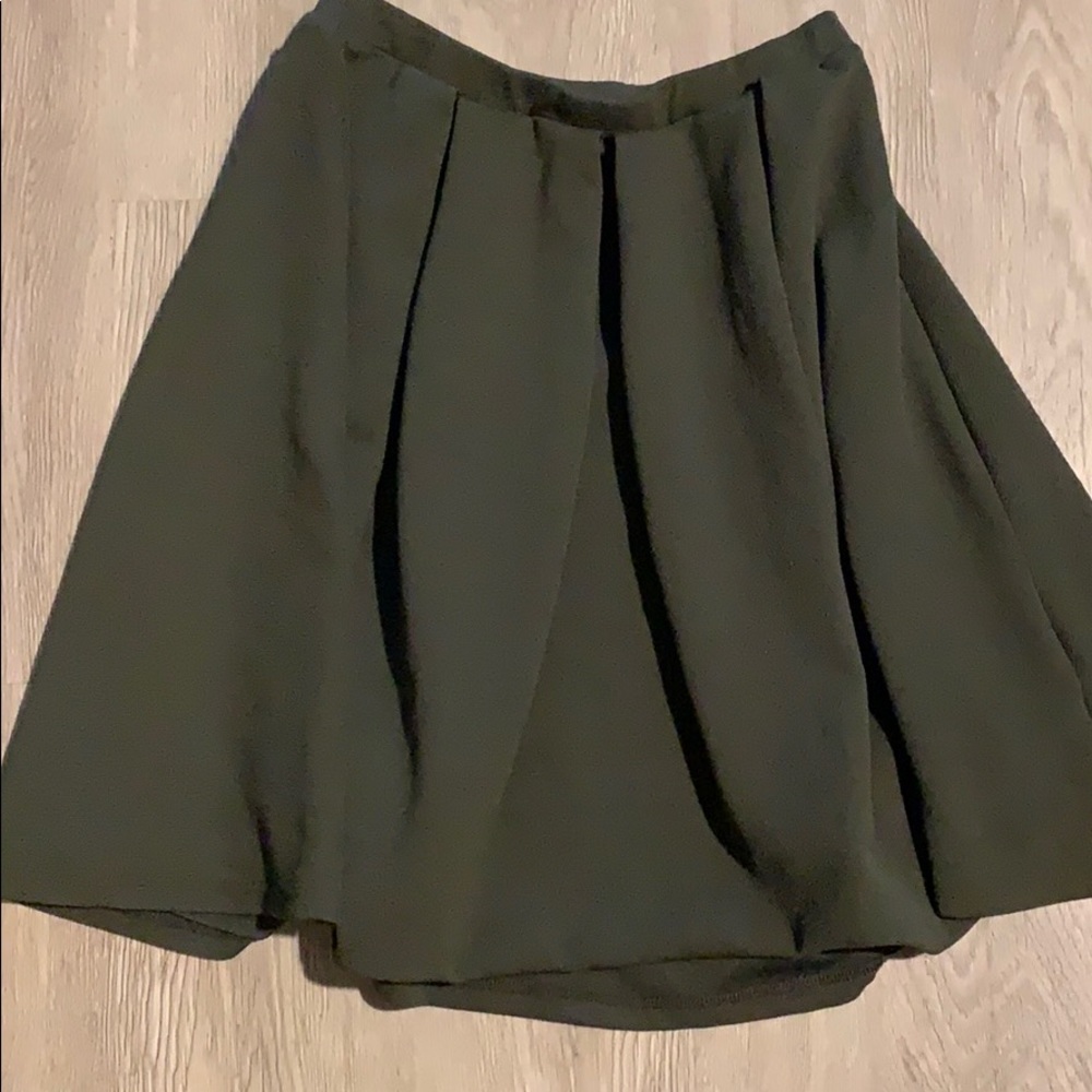 Dark green pleated skirt